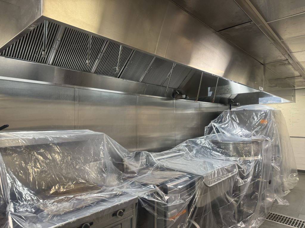 Deep grease scraping in Kitchener commercial ductwork